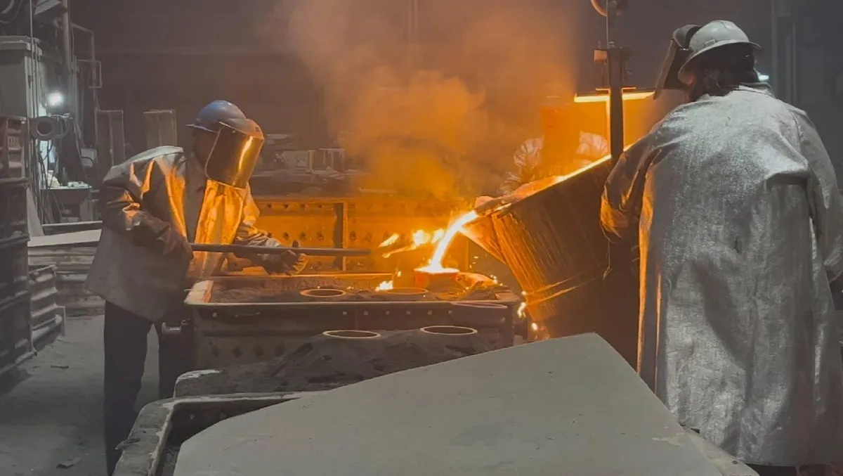 Quality inspector using CMM on large casting