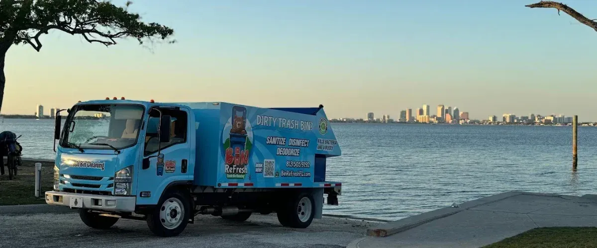 Bin Refresh trash can cleaning truck parked near the South Tampa waterfront with city skyline in the background