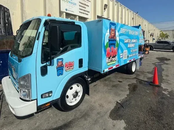 Bin Refresh trash can cleaning truck parked at EcoWash facility in South Tampa