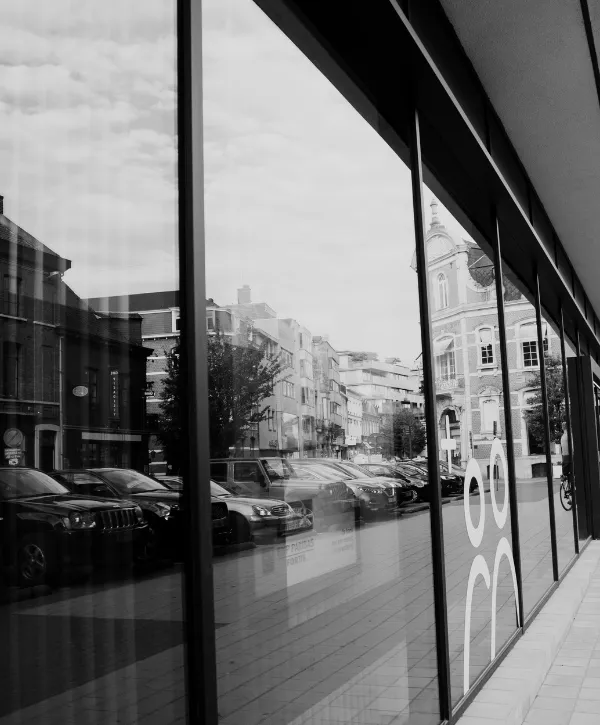 Suburban home with a clean concrete driveway and attached garage.