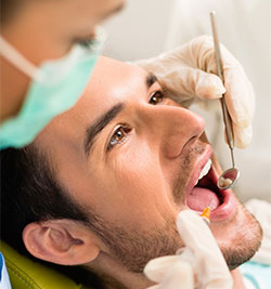 man receiving dental care