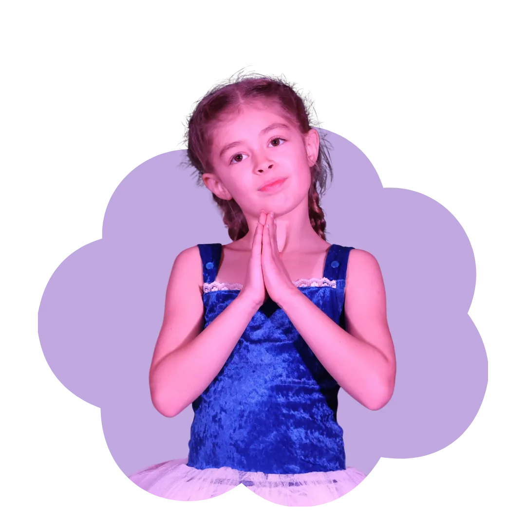 A young girl with her hands clasped together