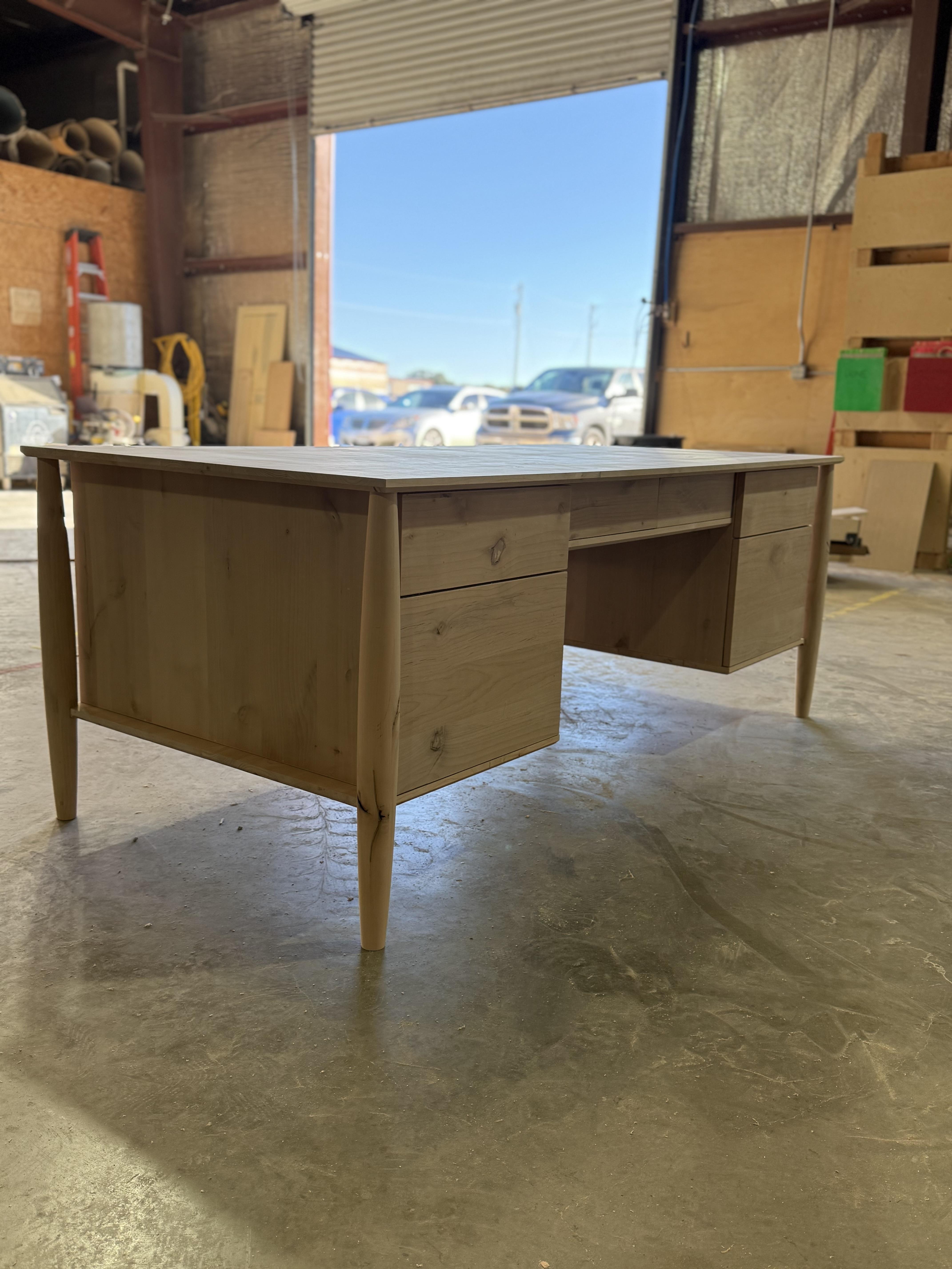 white wooden shelf with books