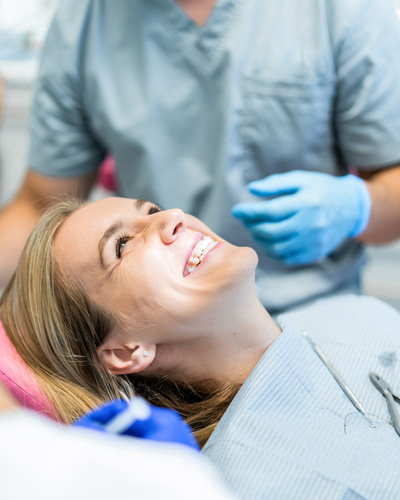 Smiling woman in dental chair