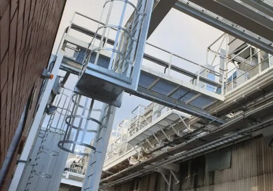 External steel fire escape staircase with galvanised handrails fabricated by PGB Steel