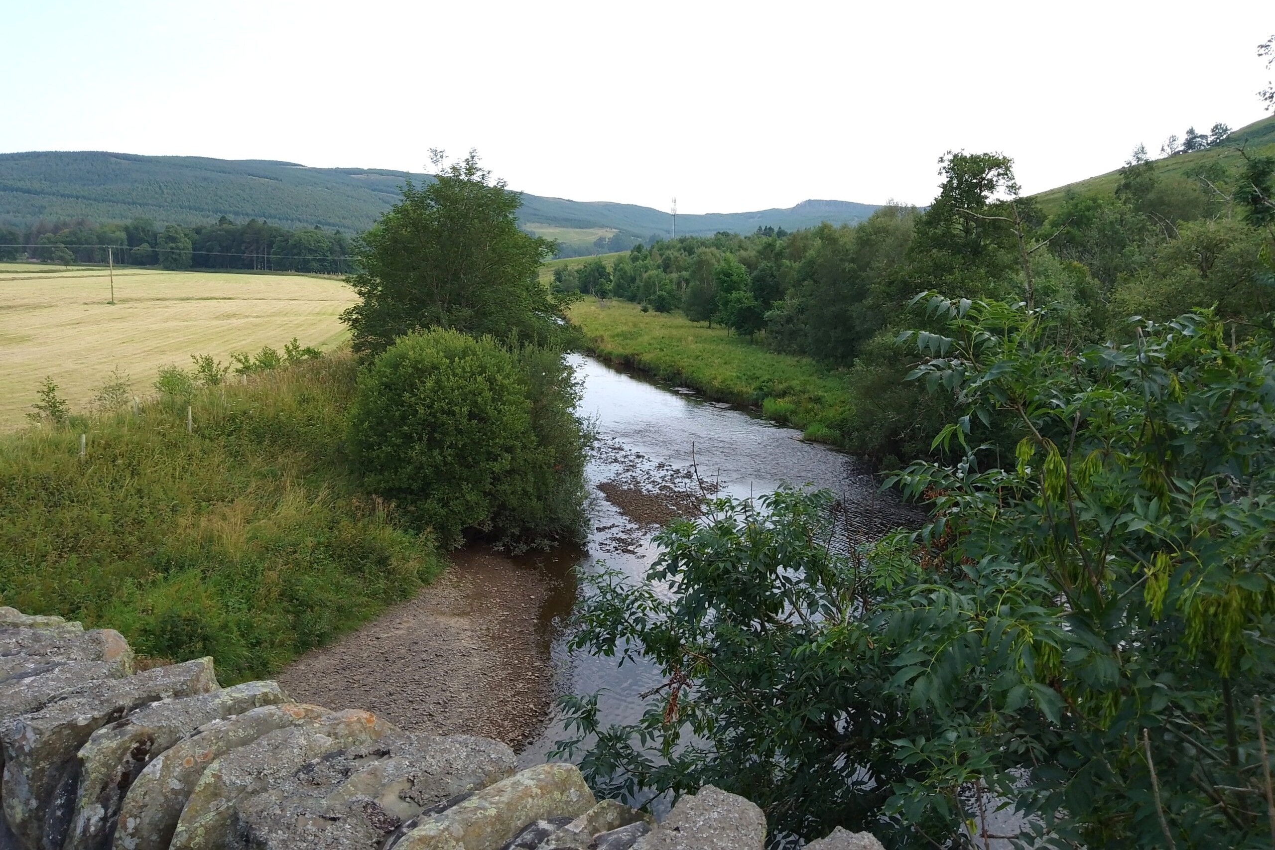 View of the Ettrick Water and surrounding countryside near The Tushielaw Inn in the Scottish Borders