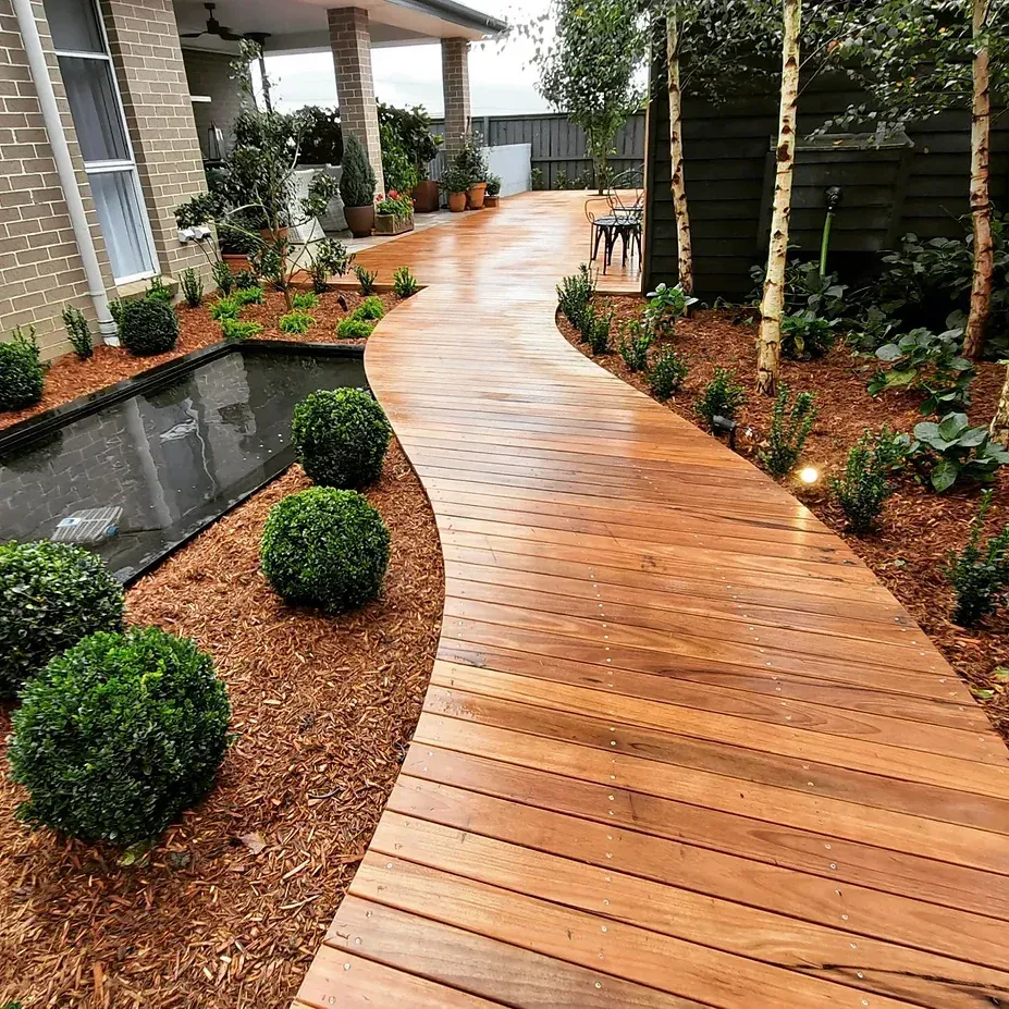 low maintenance wood deck and pond