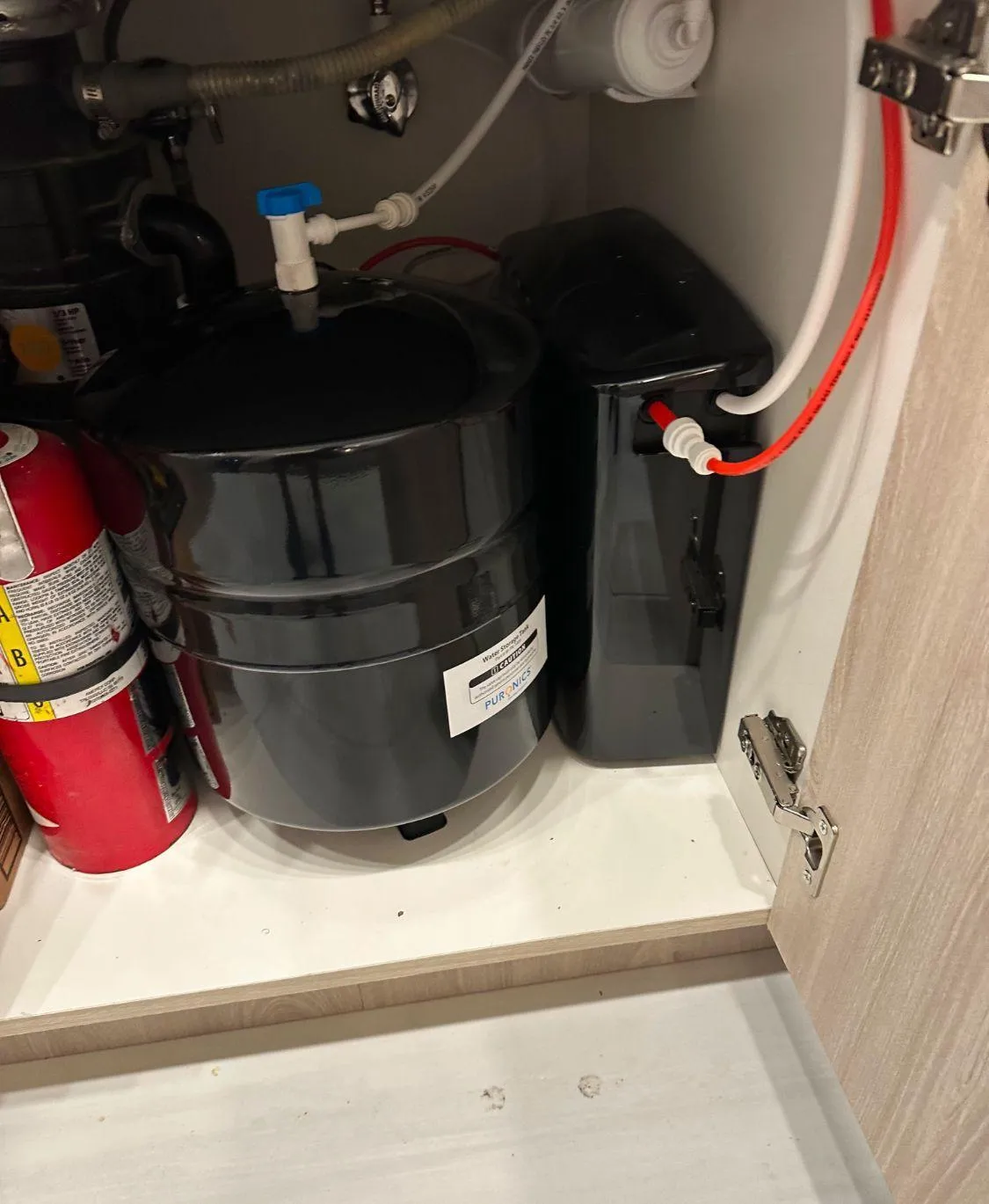 brown duck on water during daytime