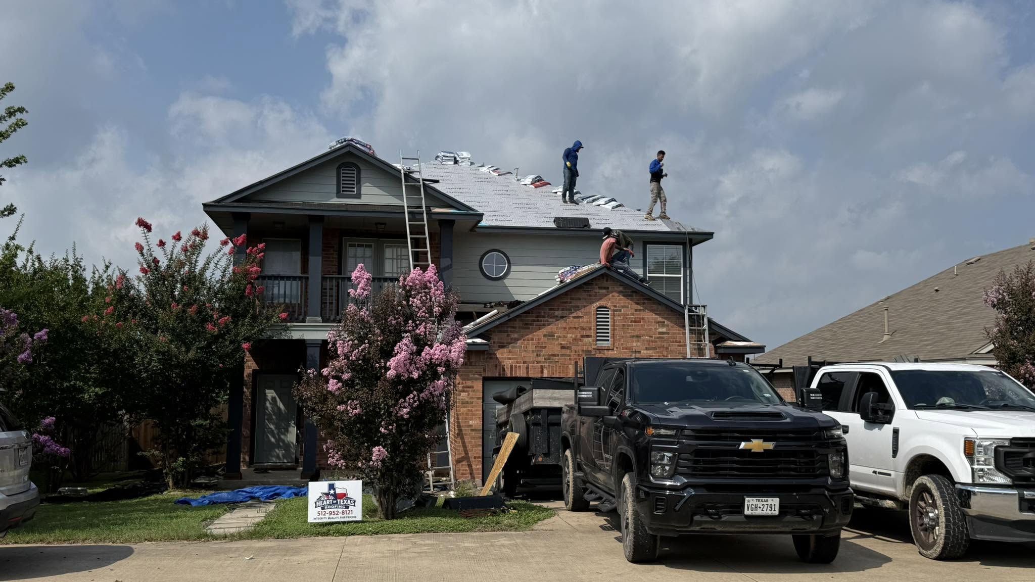a roof with a few shingles