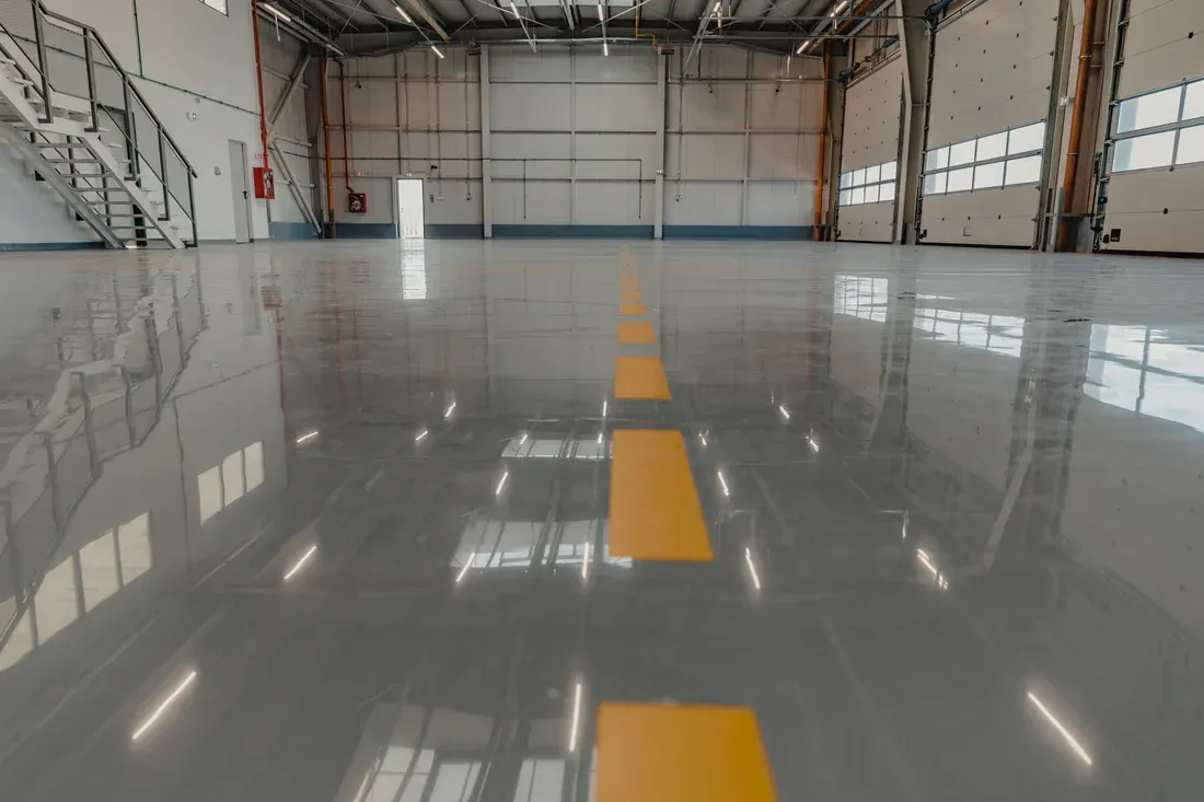 Commercial epoxy floor coating with diamond grinding surface prep