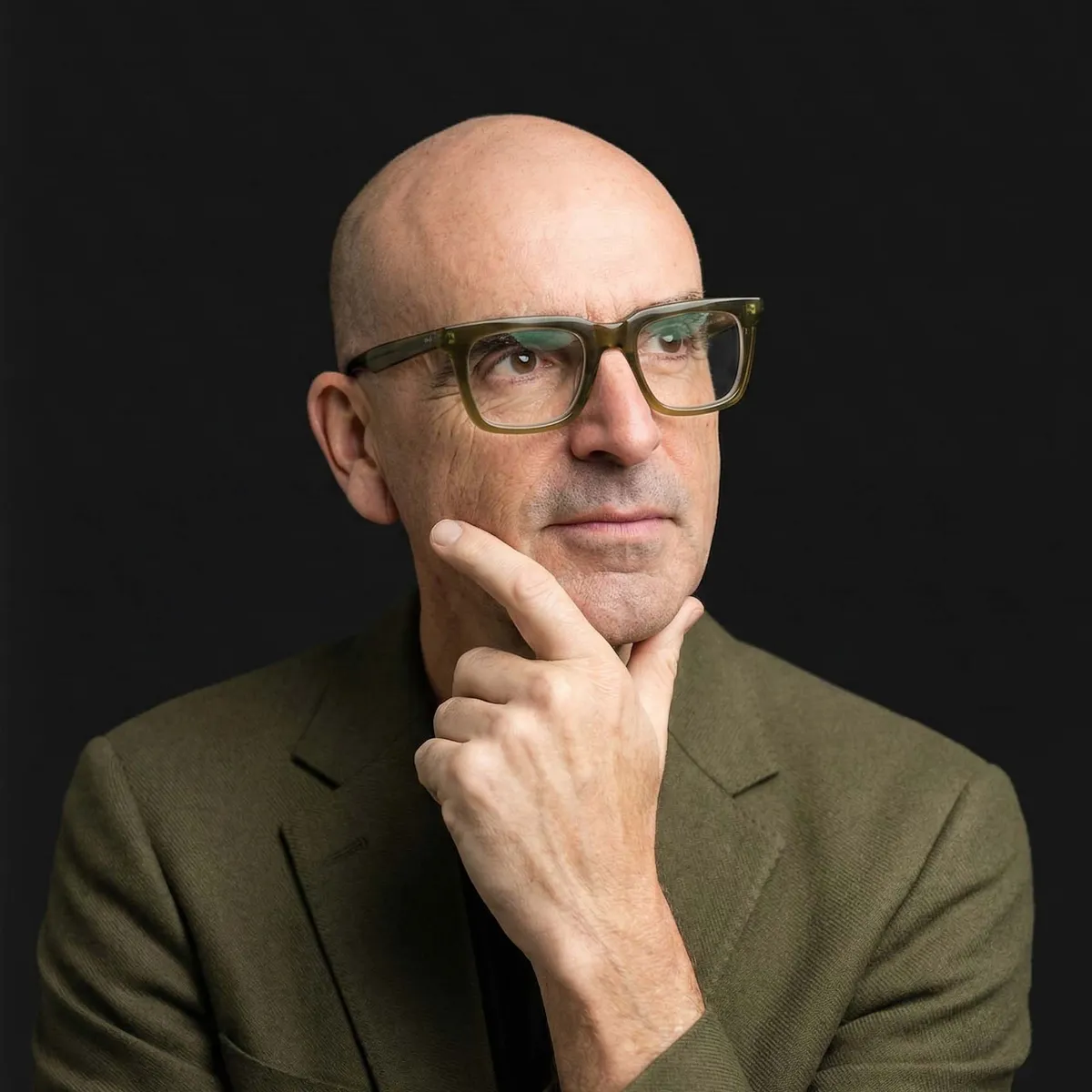 A professional portrait of a futurist architect exuding creativity and approachability