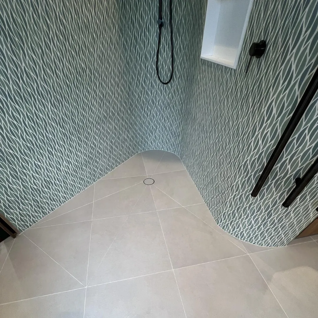 Bathroom floor and wall tiles installed by NVN Tiling Ltd Auckland