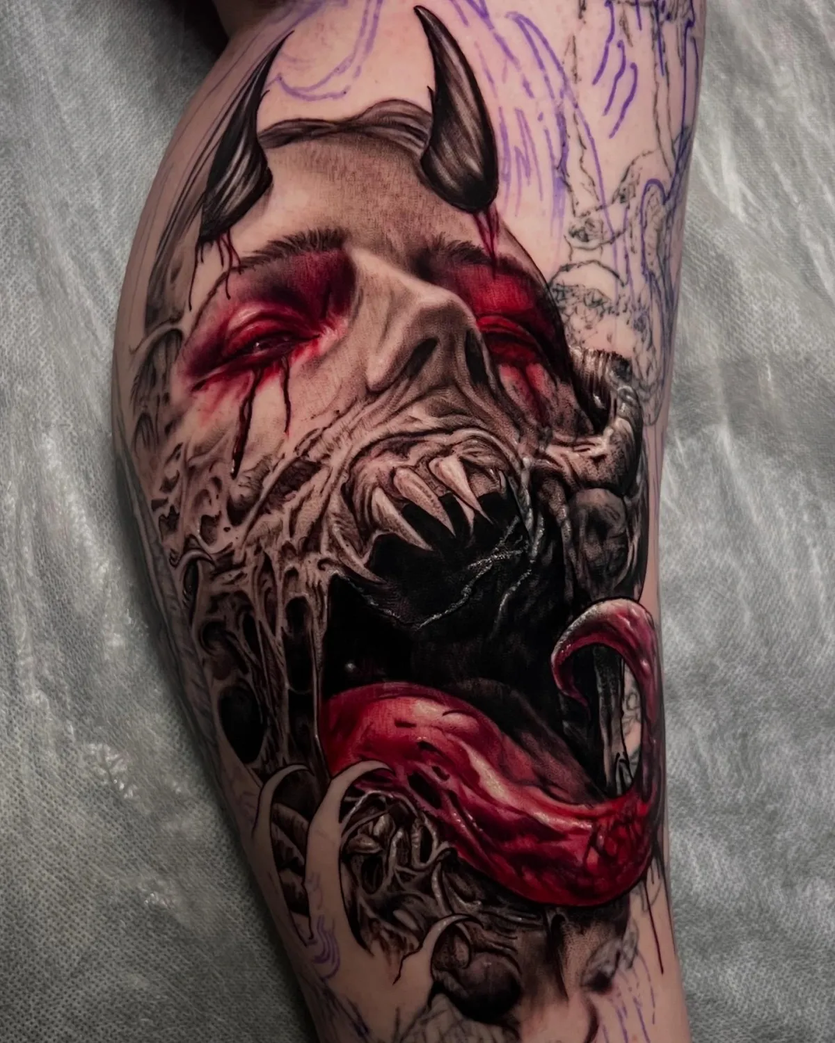 person with tattoo on right arm