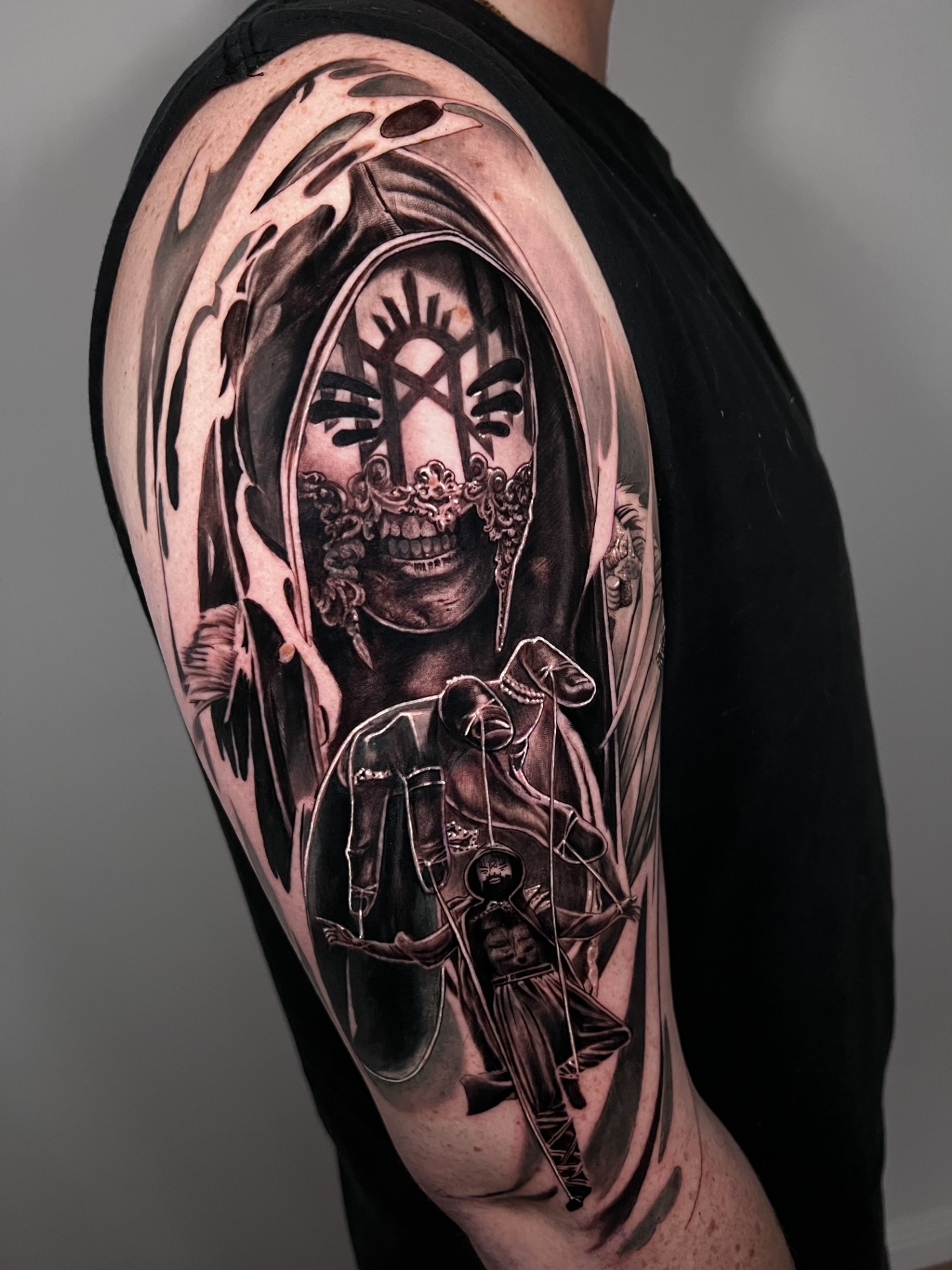person with tattoo on right arm