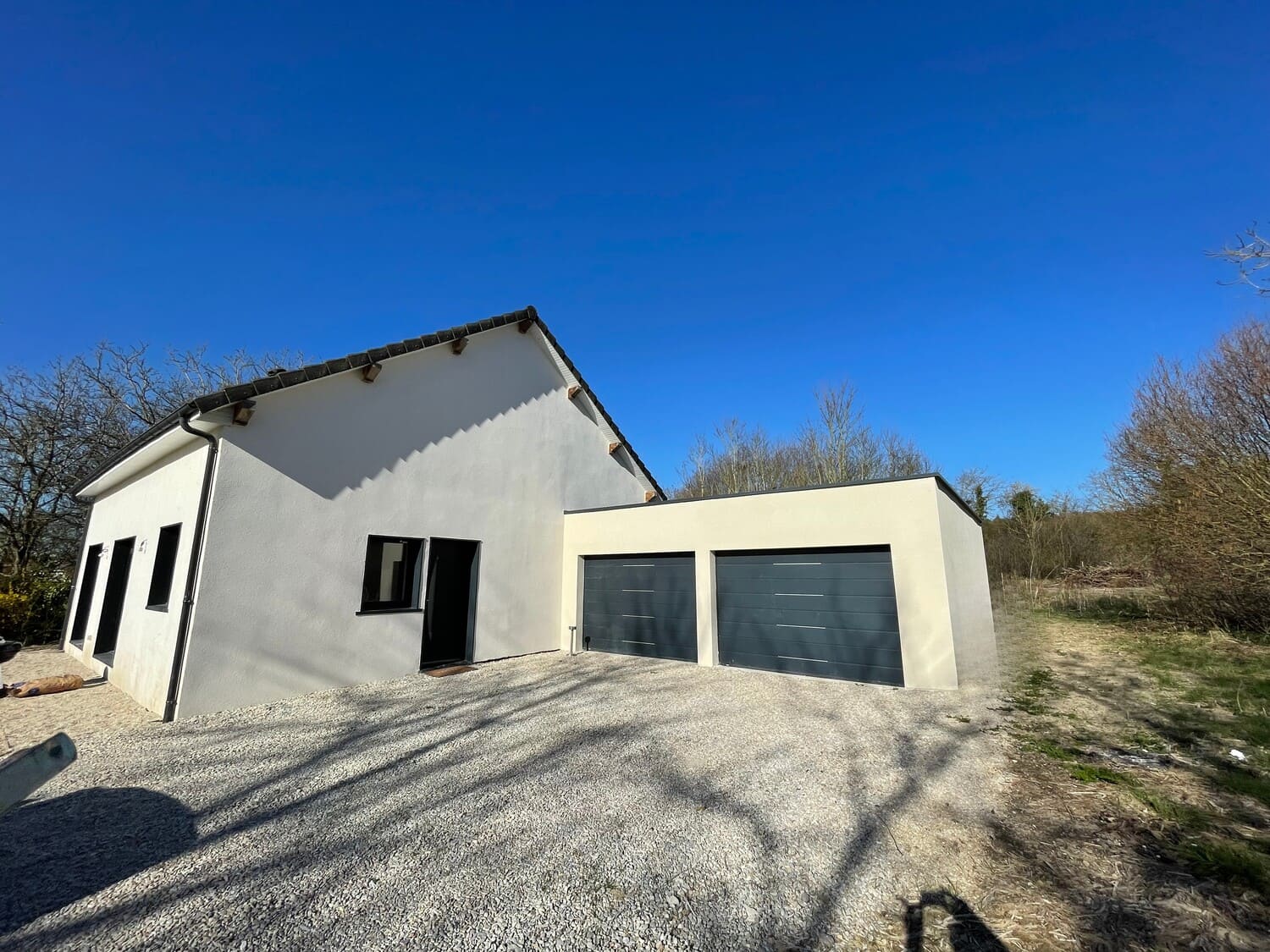 Pavillon rénové avec extension garage double à Sainte-Julien : projet maîtrise d'œuvre MS Promotion