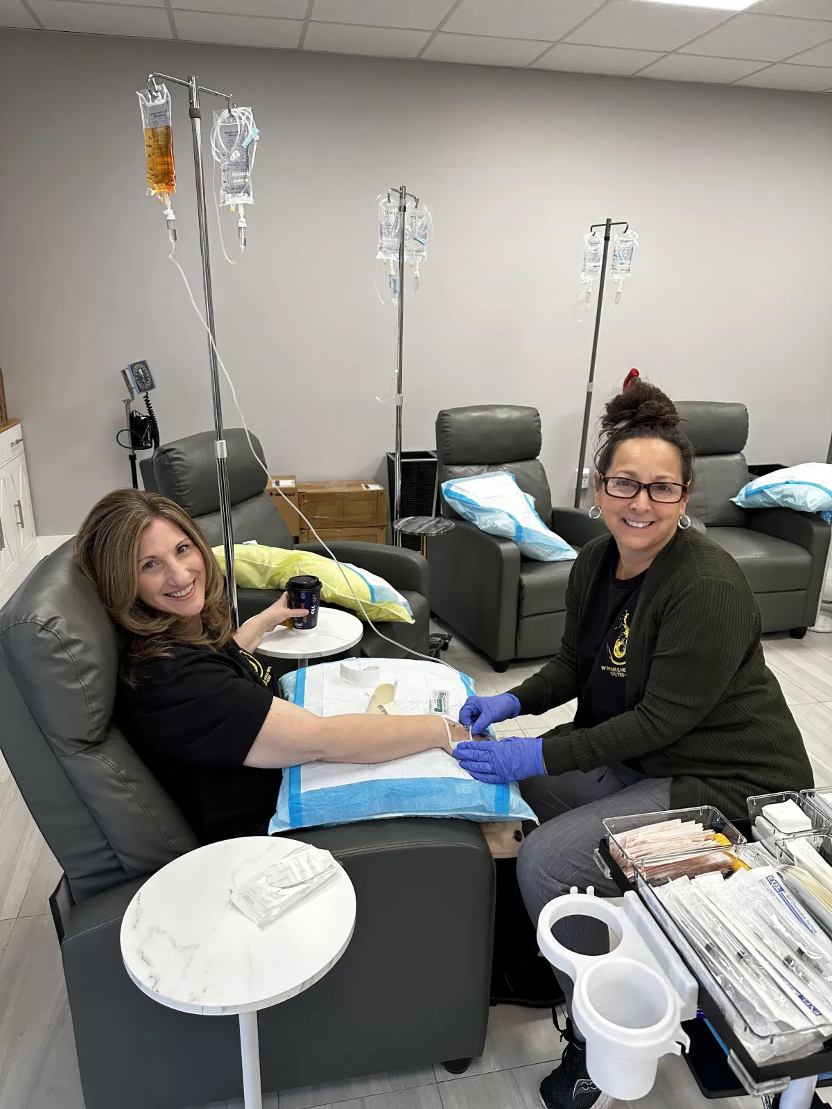 white ceramic cup on brown table