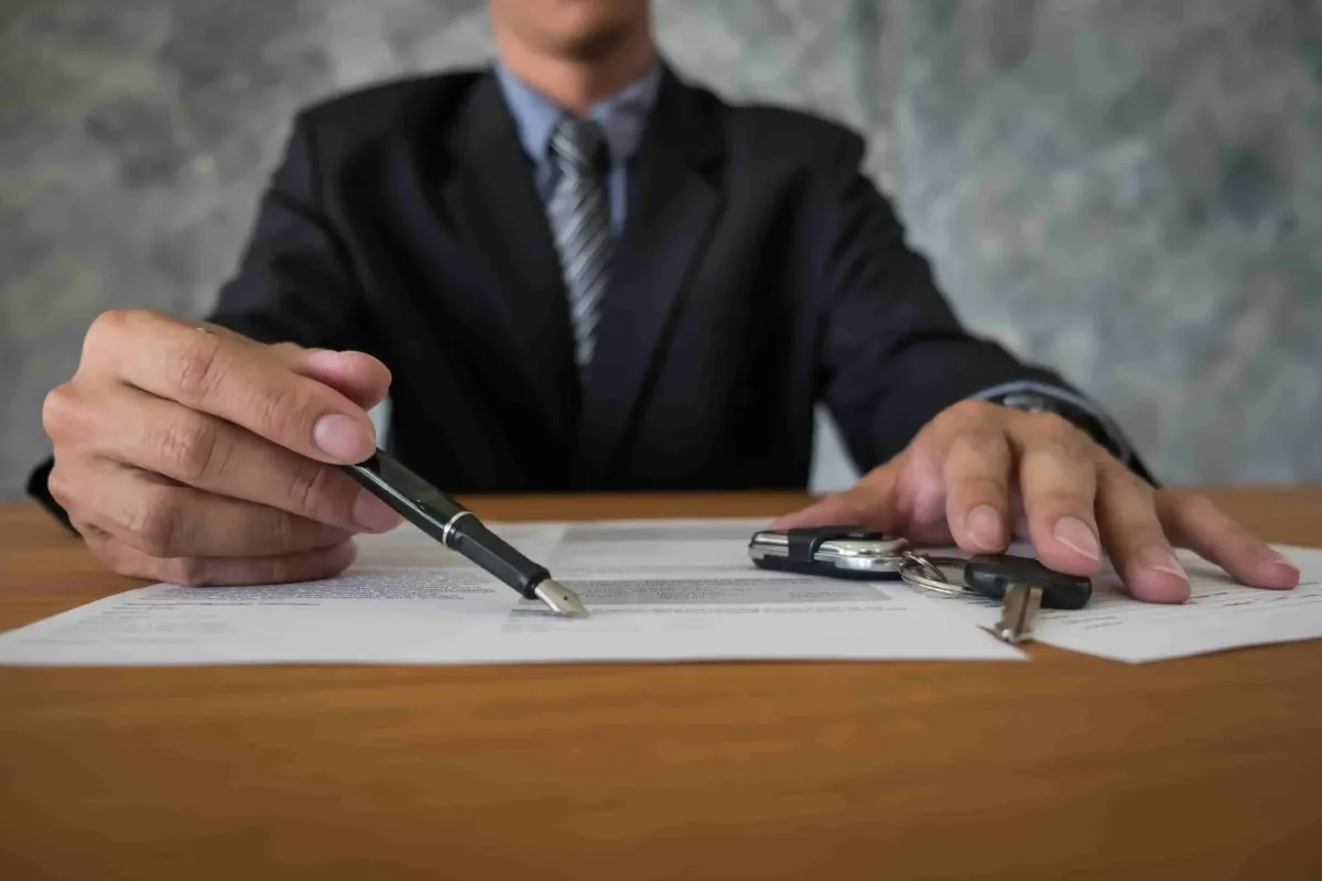 Man reviewing financial paperwork