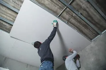 Workers Hanging Drywall