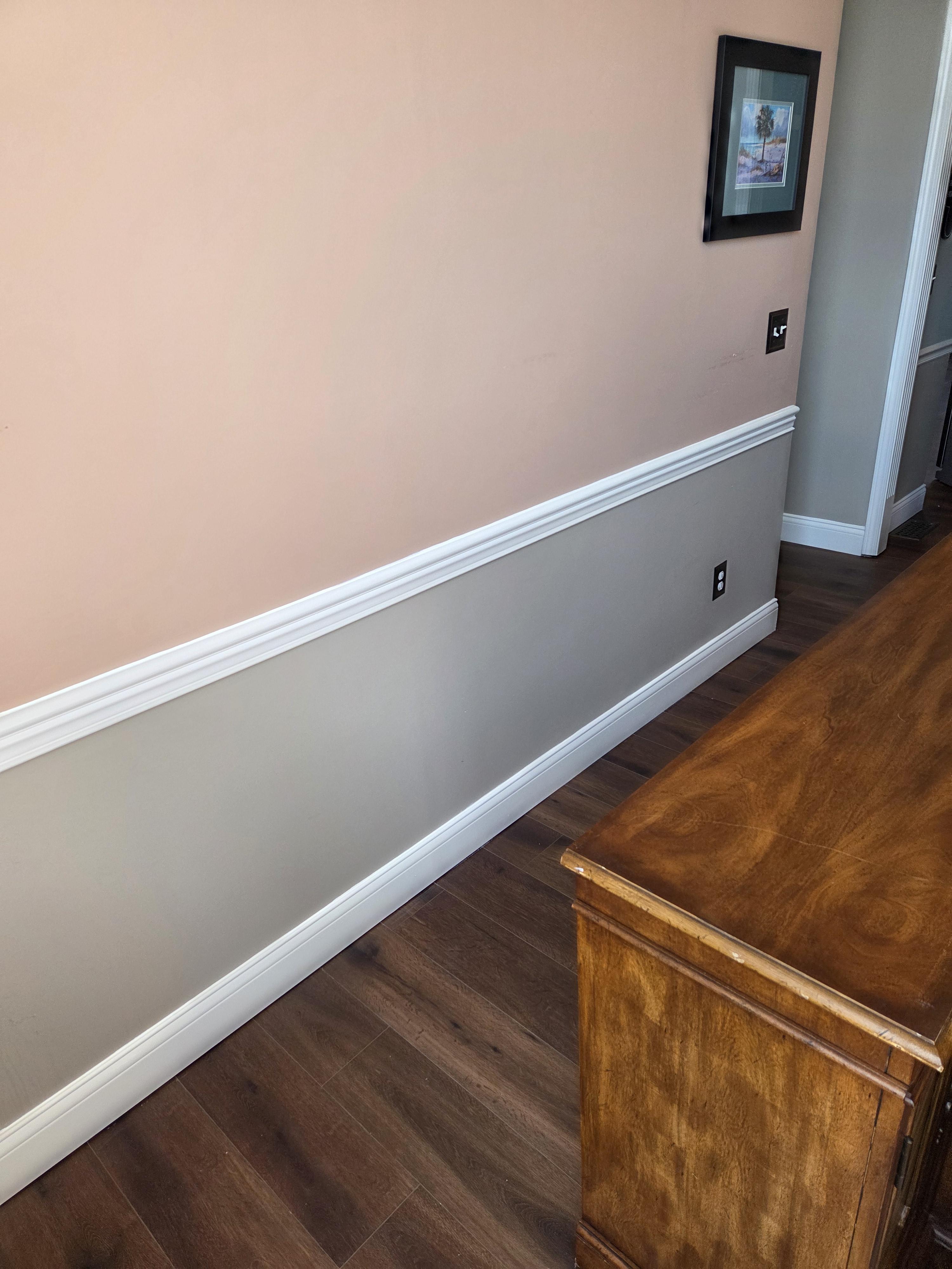 Professional interior painting with fresh coats that brighten a living room wall
