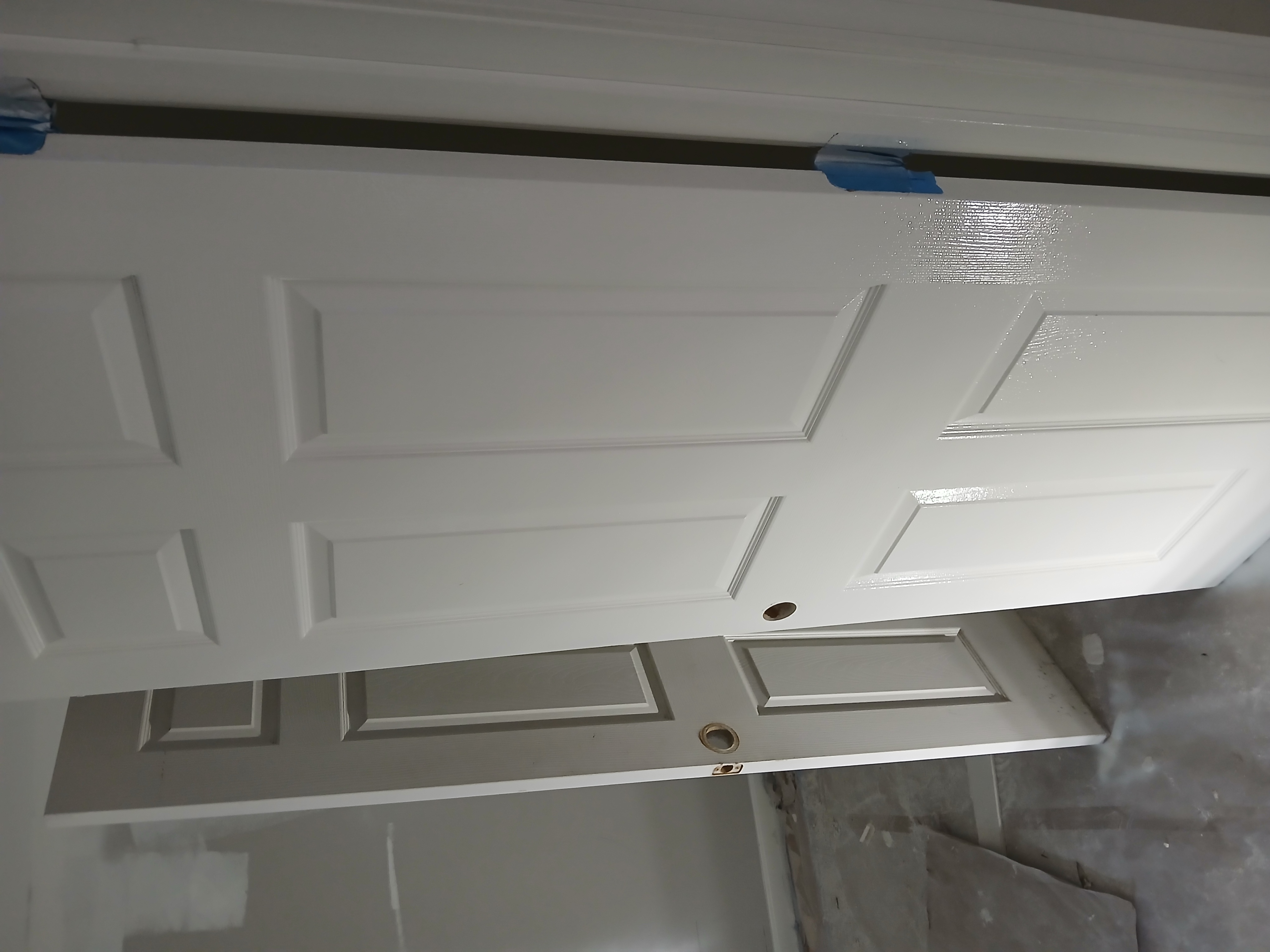 Detailed door and trim painting with a polished, durable interior finish