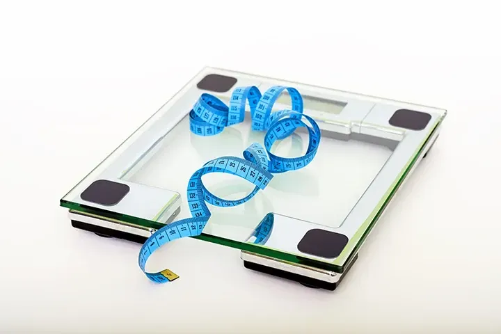 Scale with Blue Measuring Tape Bid Farewell to Yo-Yo Dieting