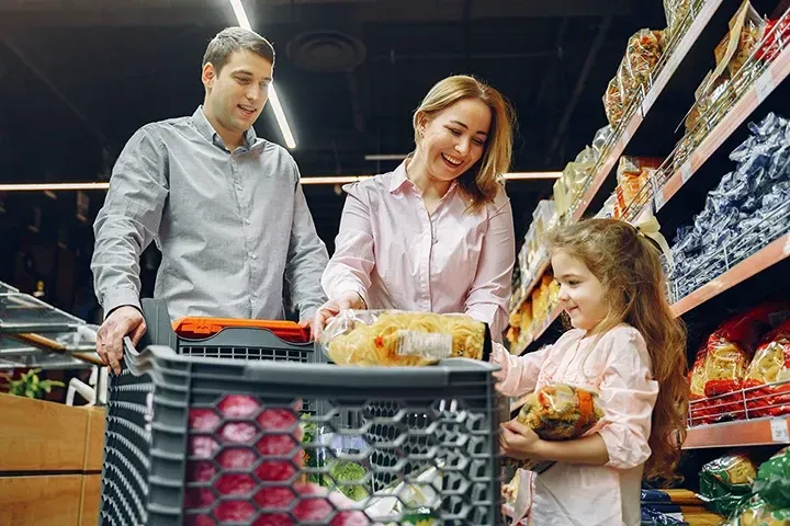 Happy Smiling Family Shopping for Healthy Groceries Sustainable Weight Loss