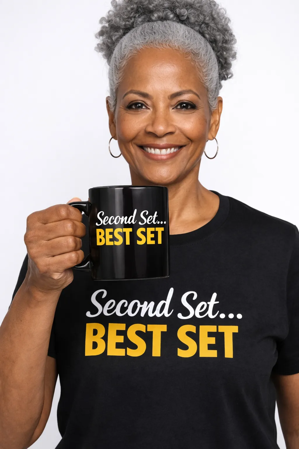 Senior smiling confidently with the Second Set BEST SET mug