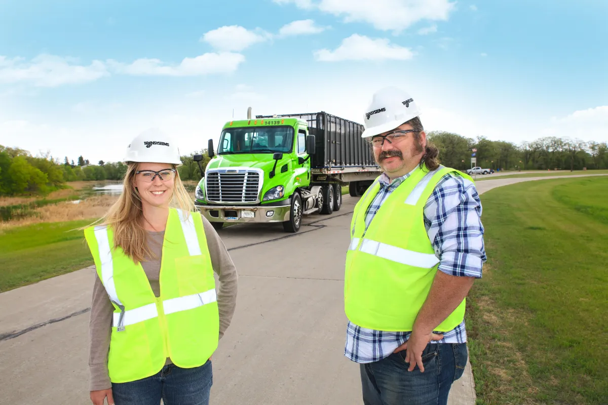 Semi Truck with cage trailer and kamatsu front end loader