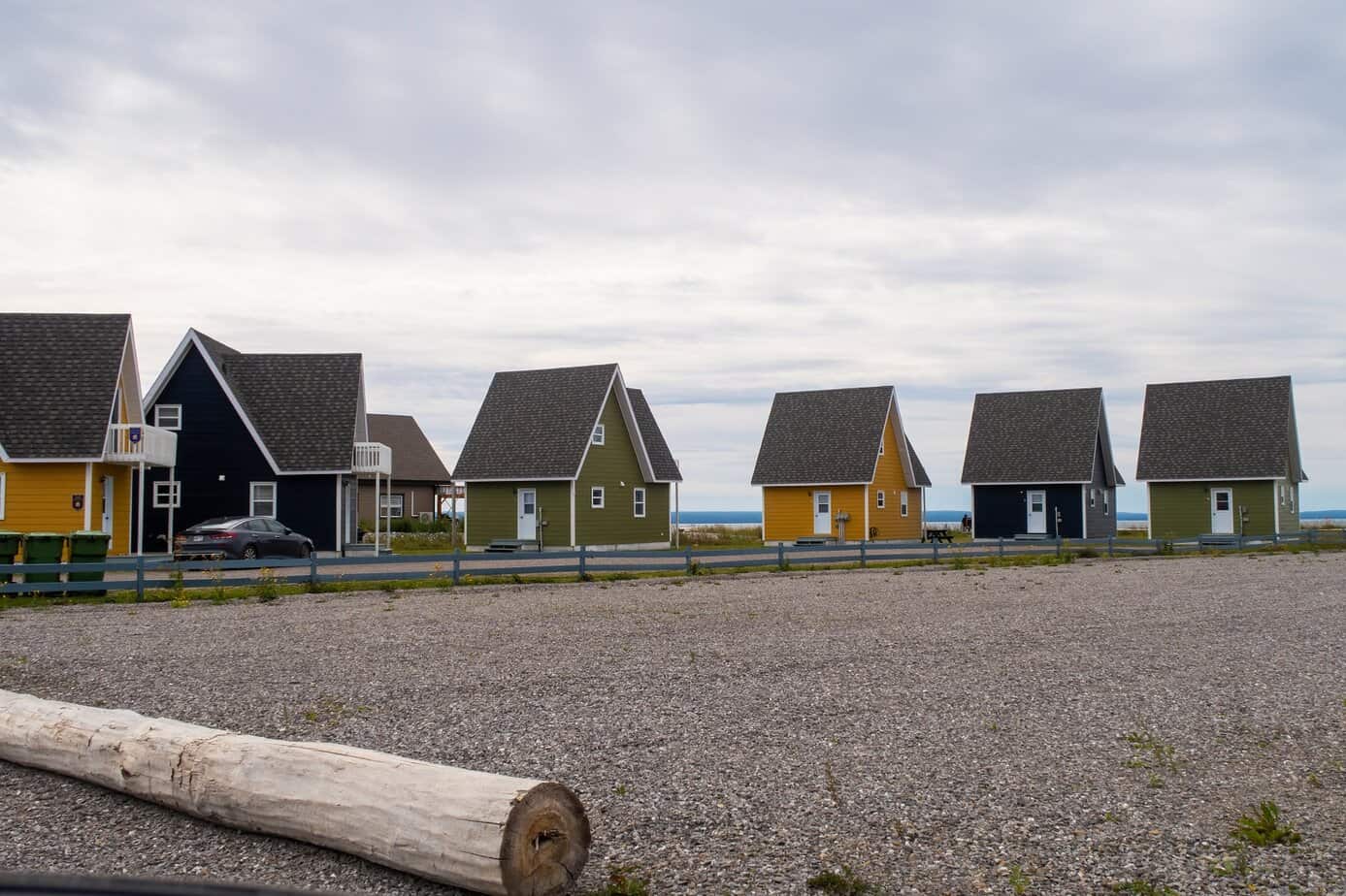 white concrete house near trees during daytime