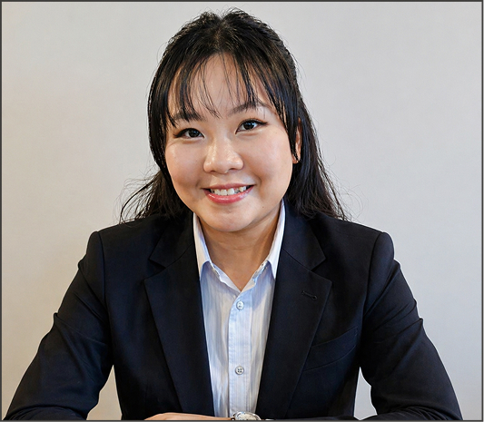 Professional headshot of smiling Khanh Birchfield, Berkeley County VW bookkeeper, in black blazer and white shirt.