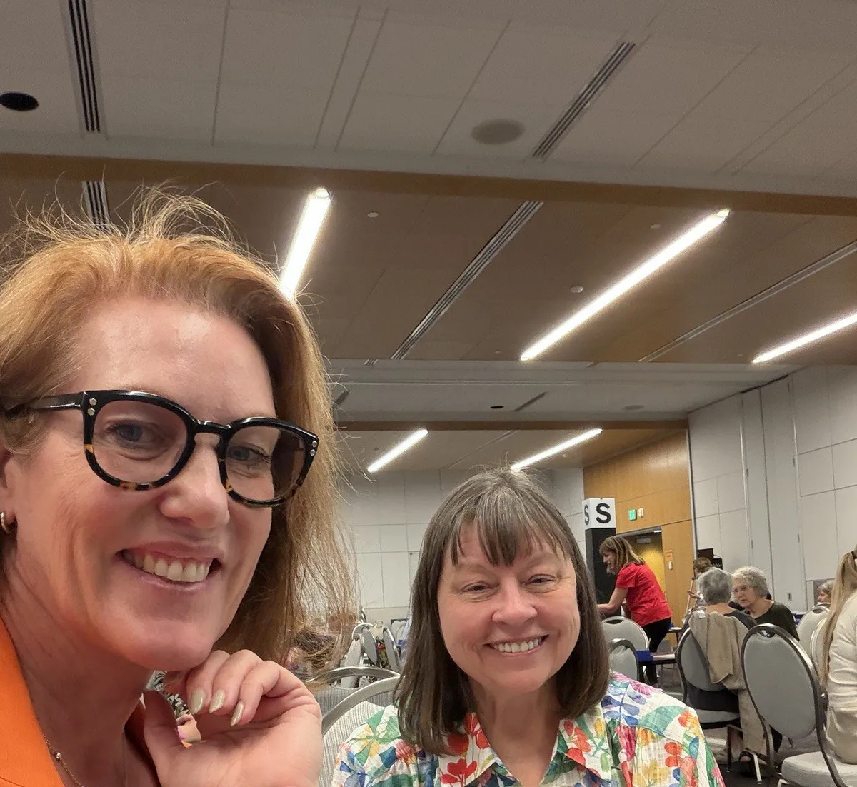 Tracey Bauer at the table with a partner
