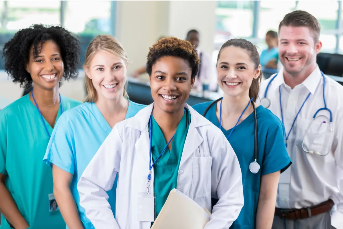 Group of diverse healthcare professionals, representing maternal health experts.