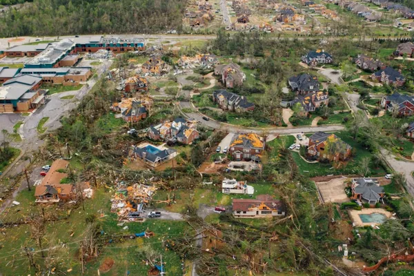 Photo of houses damaged by a hurricane