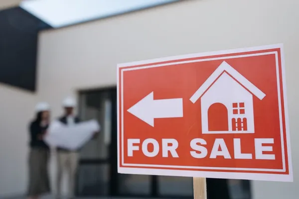 For sale sign in front of a Florida home