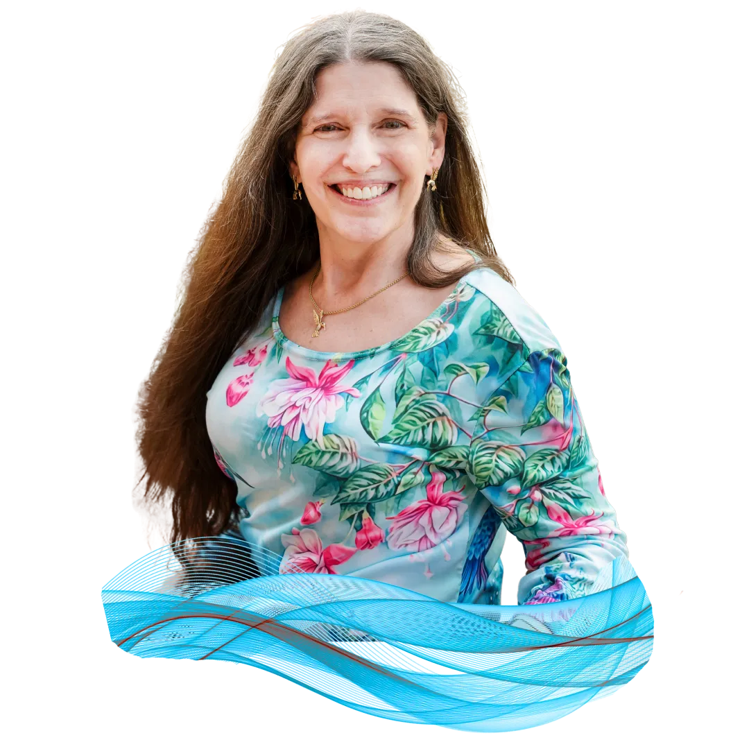 Portrait of Victoria Essner, also known as Vickie-Hummingbird, a legally blind Christian wife, caregiver, and international best-selling author. Smiling with confidence, she stands as a leader in assistive technology and caregiving advocacy.