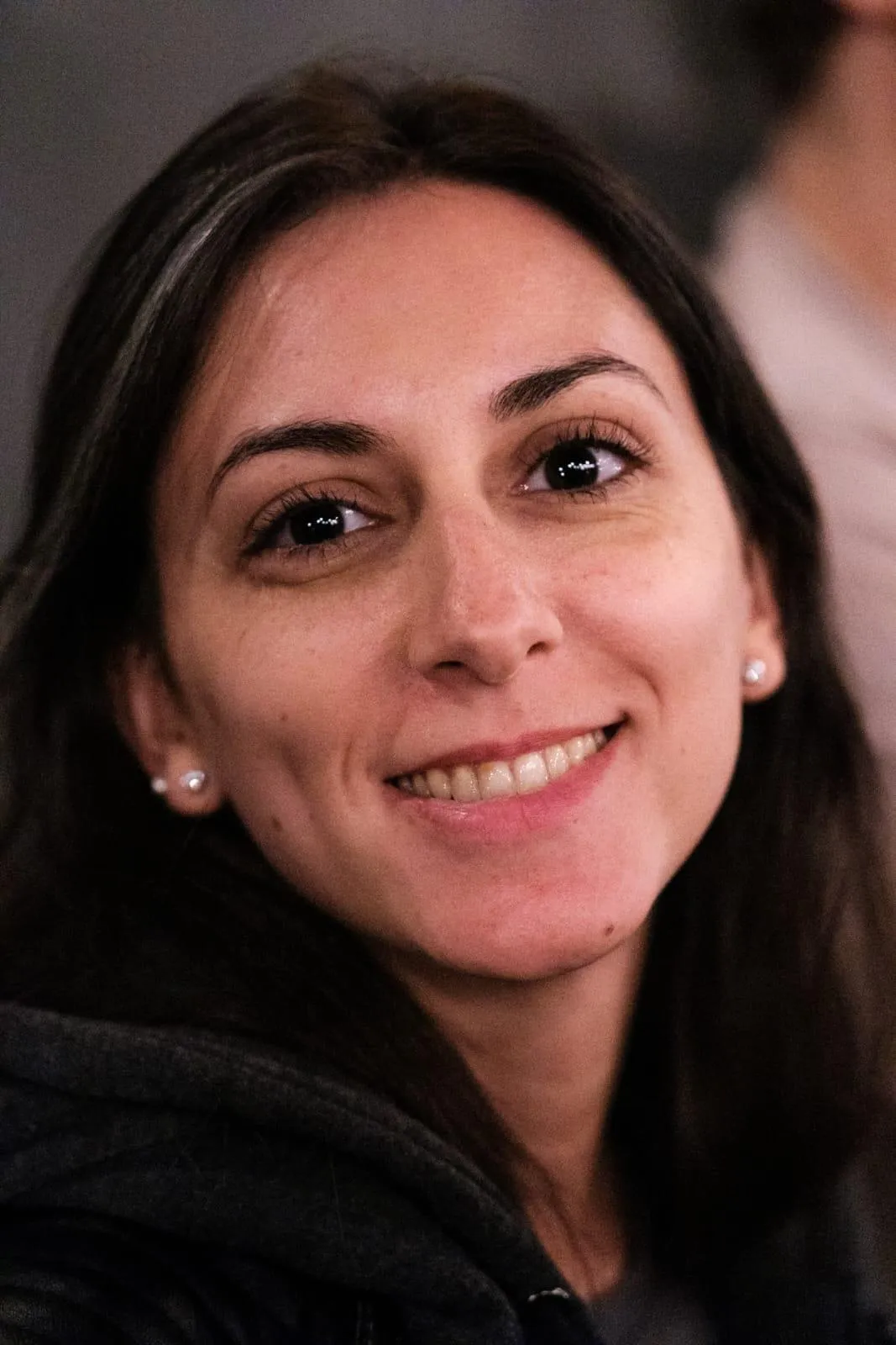 Founder of Lucero Method, mindset and manifestation coach smiling confidently, helping women heal after heartbreak and guiding them through personal growth and self-love