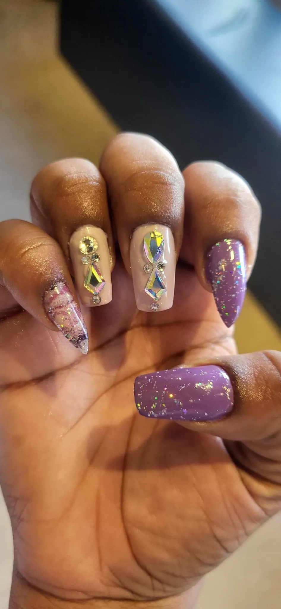 orange flower in brown pot