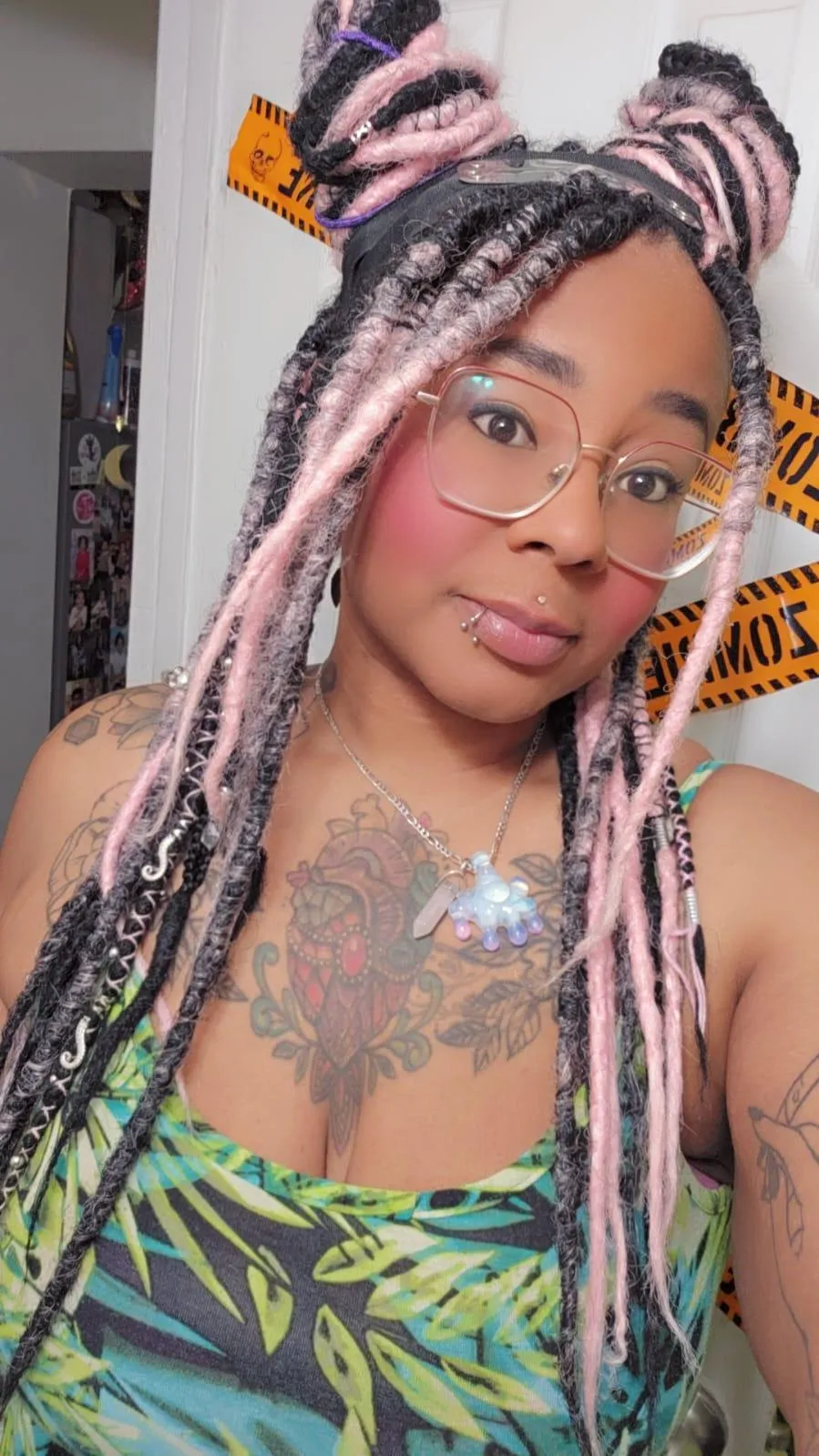 a yellow race car driving down a race track