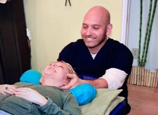 Dr Todd Gewant working with a patient in his Santa Monica office