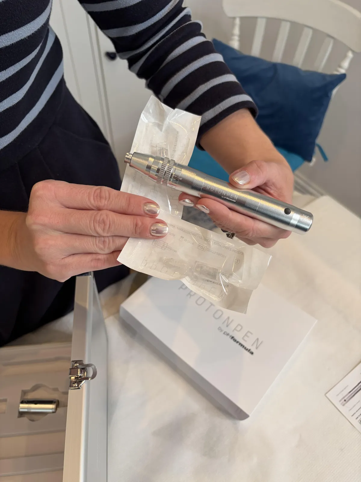 Close‑up of pHformula Proton Pen used for tailored microneedling treatments in Worthing