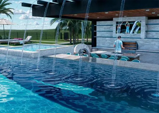 Resort-style pool with water arches, swim-up bar seating, outdoor kitchen, and TV entertainment area under modern pergola.