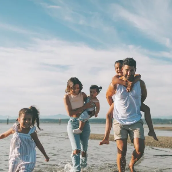 Happy family at the beach 