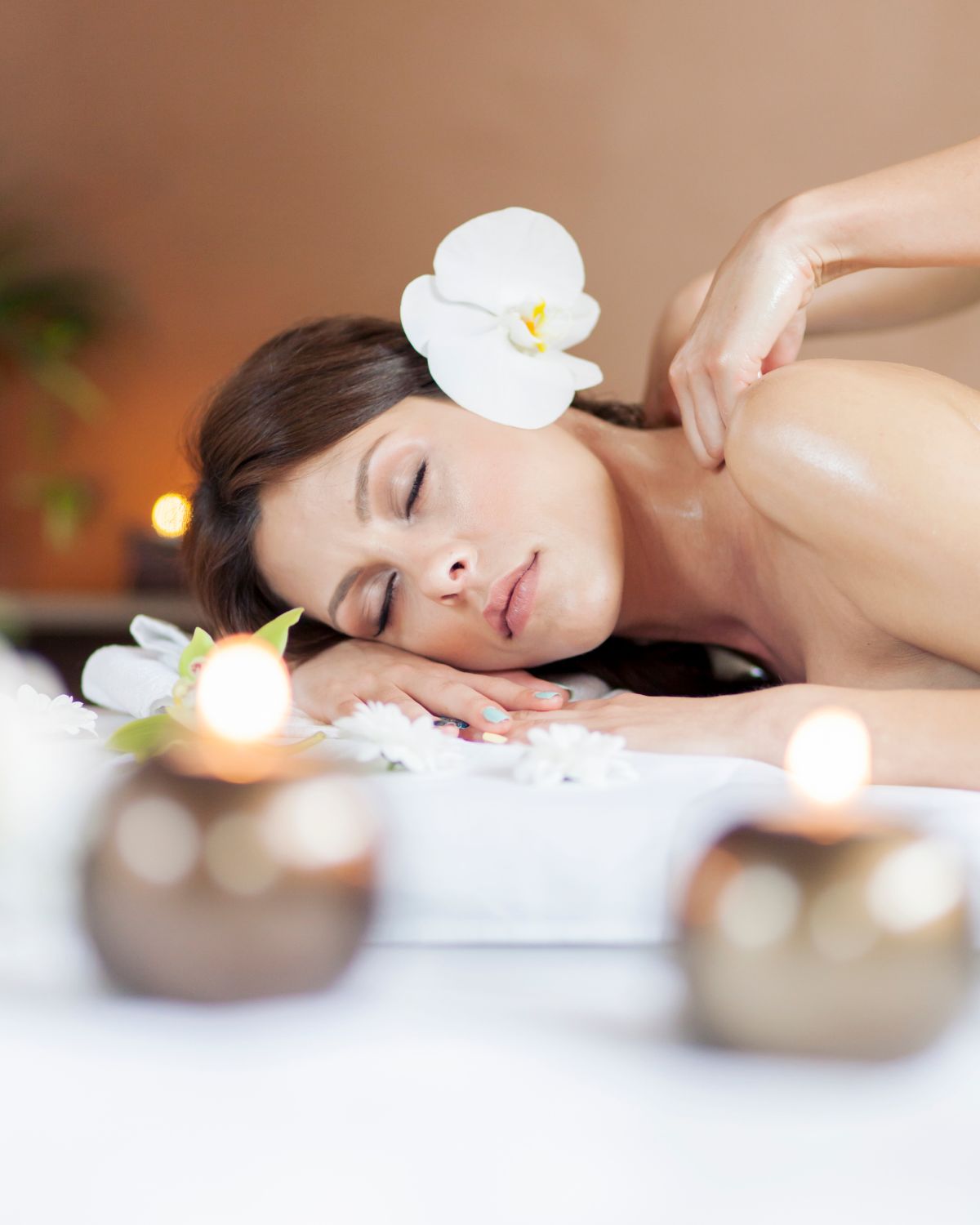 Professional Thai massage therapist providing relaxing massage in