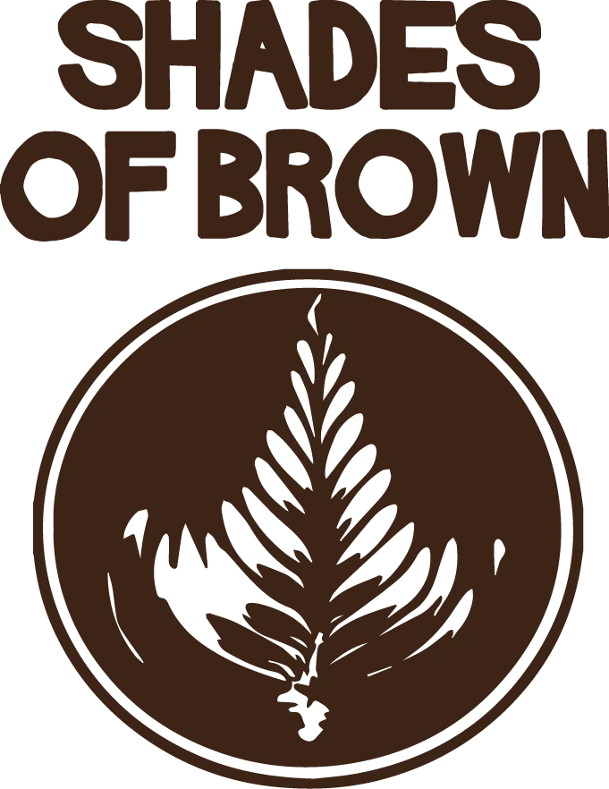Exterior of Shades of Brown Coffee & Art on Brookside in Midtown Tulsa, a locally owned coffee shop known for specialty coffee, local art, and a welcoming atmosphere.