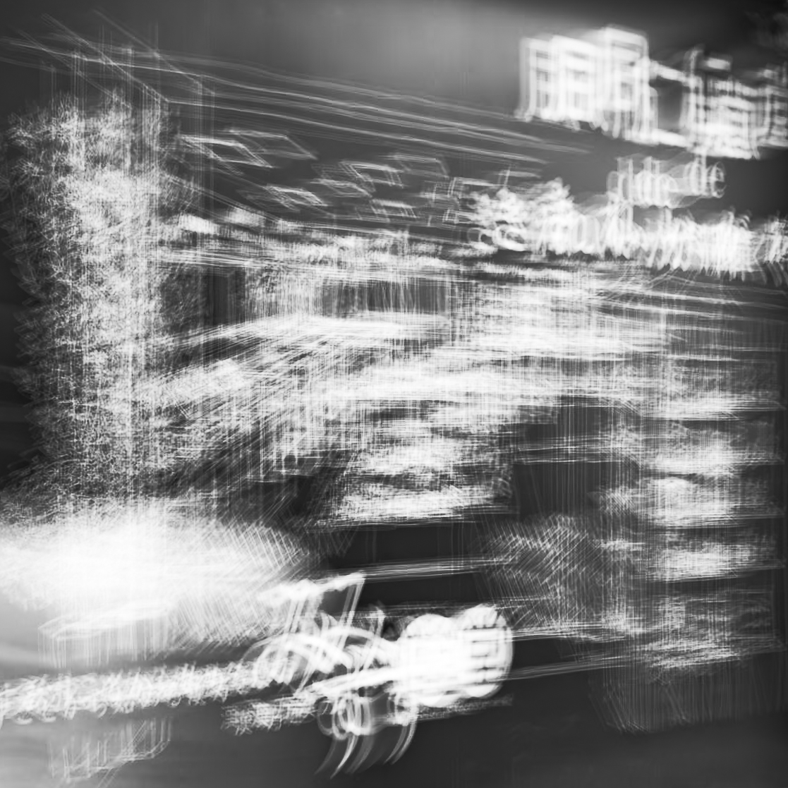 Japanese mural captured in motion on a Kumamoto street, characters and imagery fracturing into light trails and abstract mark-making, monochrome ICM fine art photograph by Angie Harker