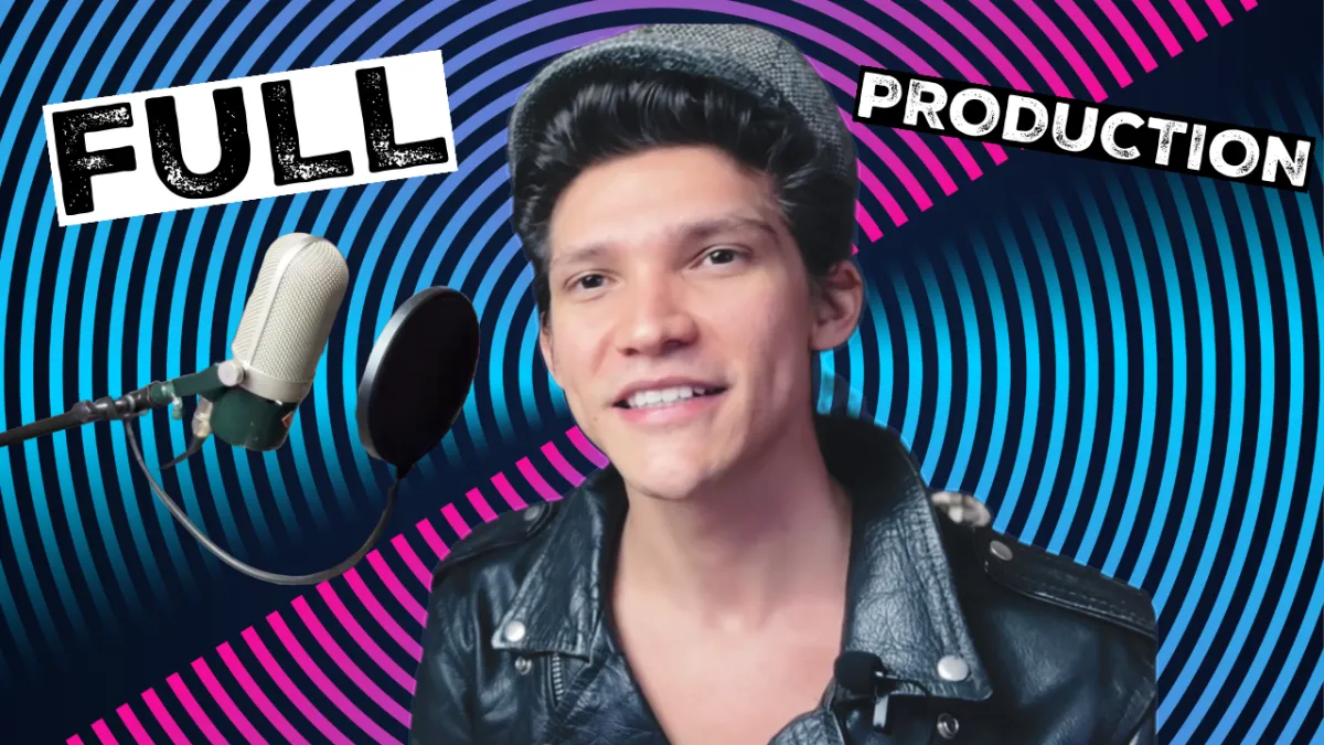 a table with speakers and a laptop on it