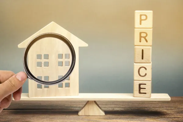 Home pricing strategy concept showing price adjustments and equity impact in Ashburn Virginia real estate market