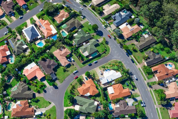 Real estate investment strategy concept showing property types and long-term wealth planning