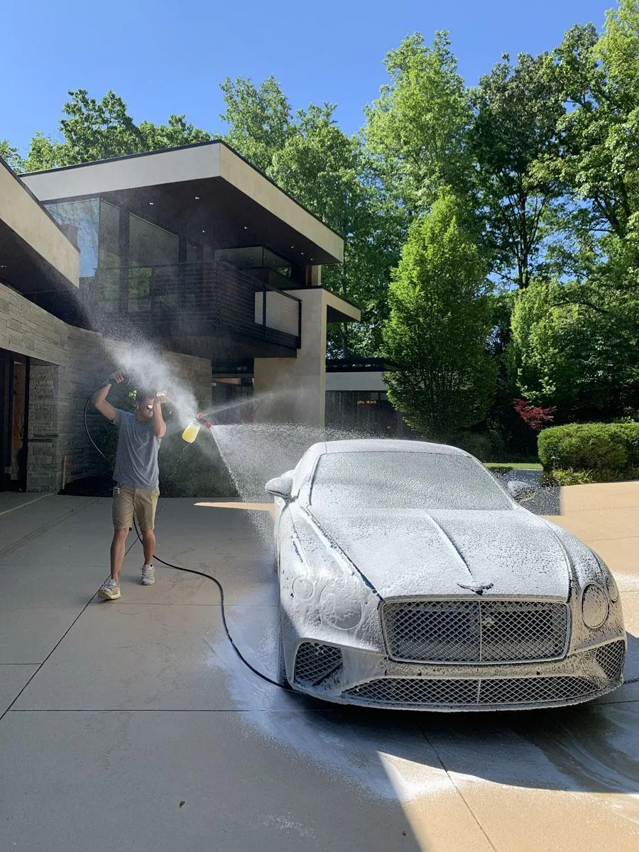 Detailing expert performing multi-step paint correction
