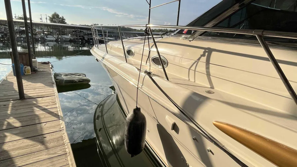 Boat detailing dockside in Florida marina
